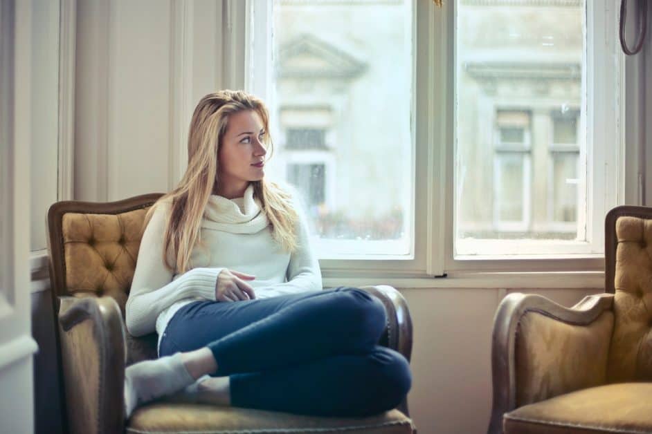 Self-love can mean different things to different people, including sitting in a comfy chair like this woman