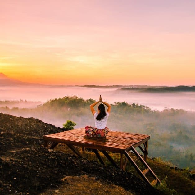 Zen meditation can be the best way to relax and enhance your calm, although you don't have to travel to the top of the world to do it, this woman sitting in the clouds just felt like it.