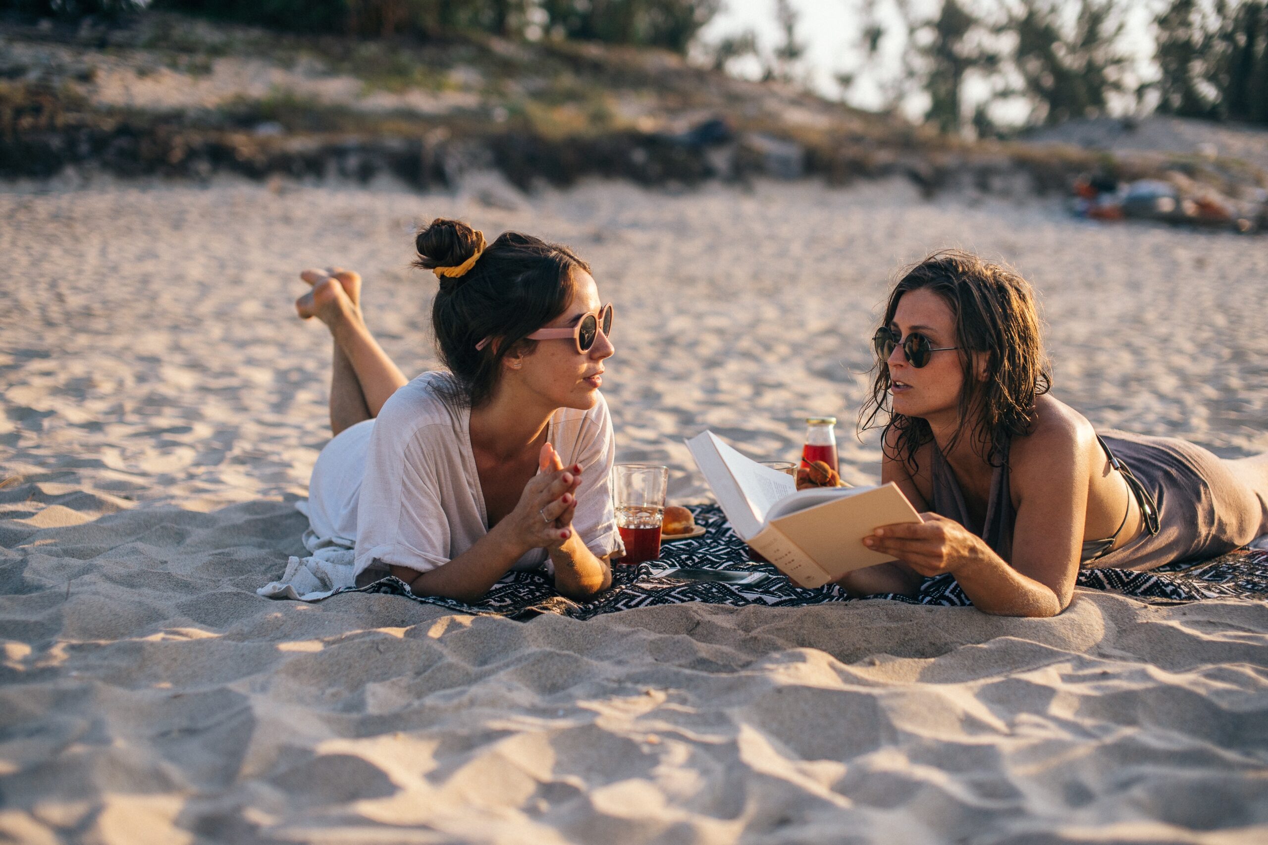 women chat at the beach